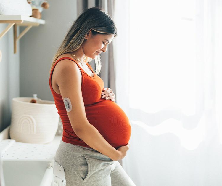 Mother watching her baby