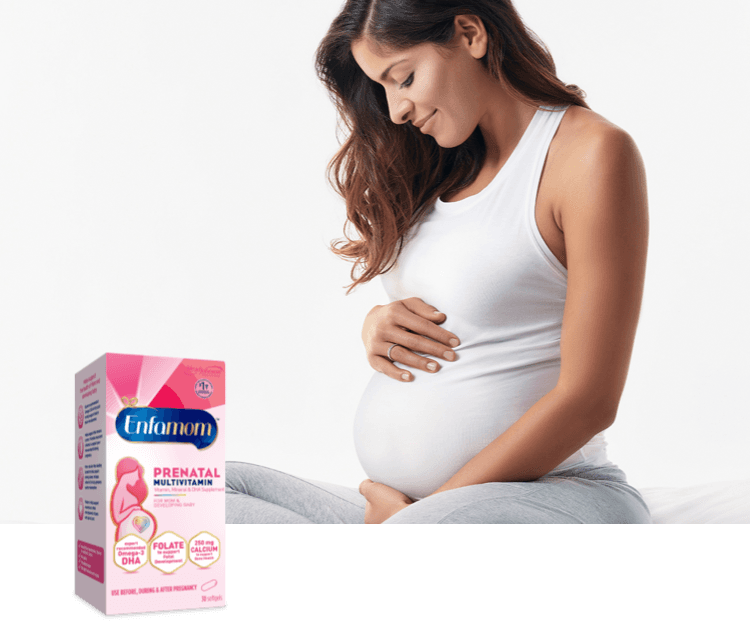 Women holding pregnant belly