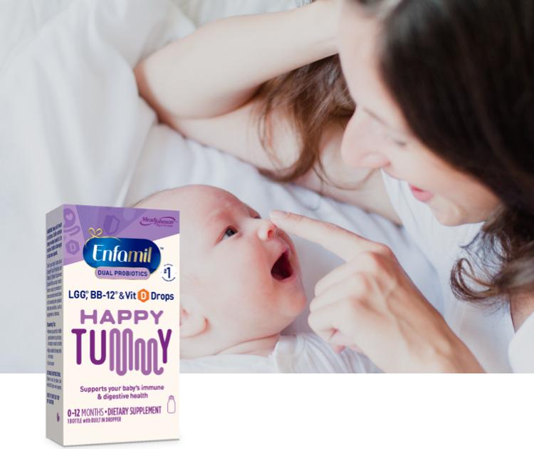 Mom and infant laying next to each other smiling, Enfamil® Dual Probiotics